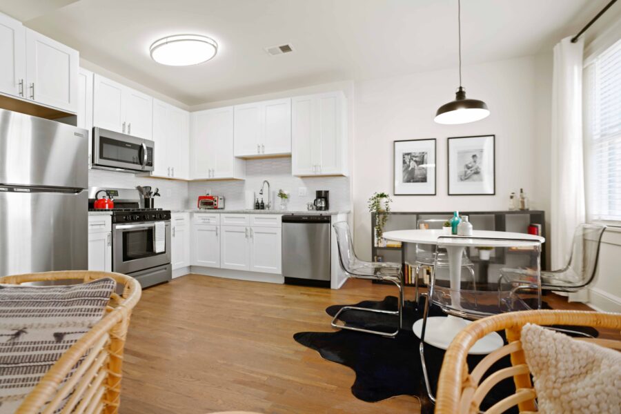 open kitchen and dining room with wood flooring