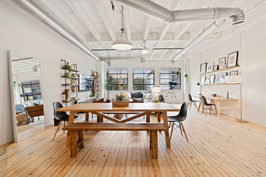 open dining room and living room with wood floors