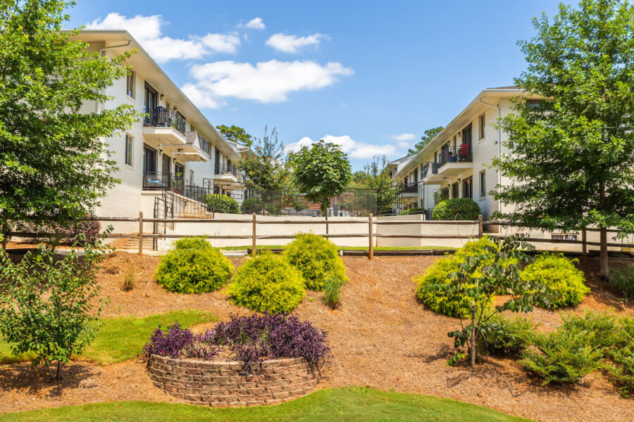 landscaping next to apartment buildings