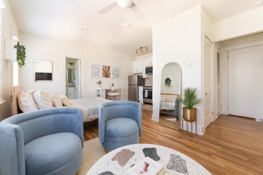 a living room with wood floors